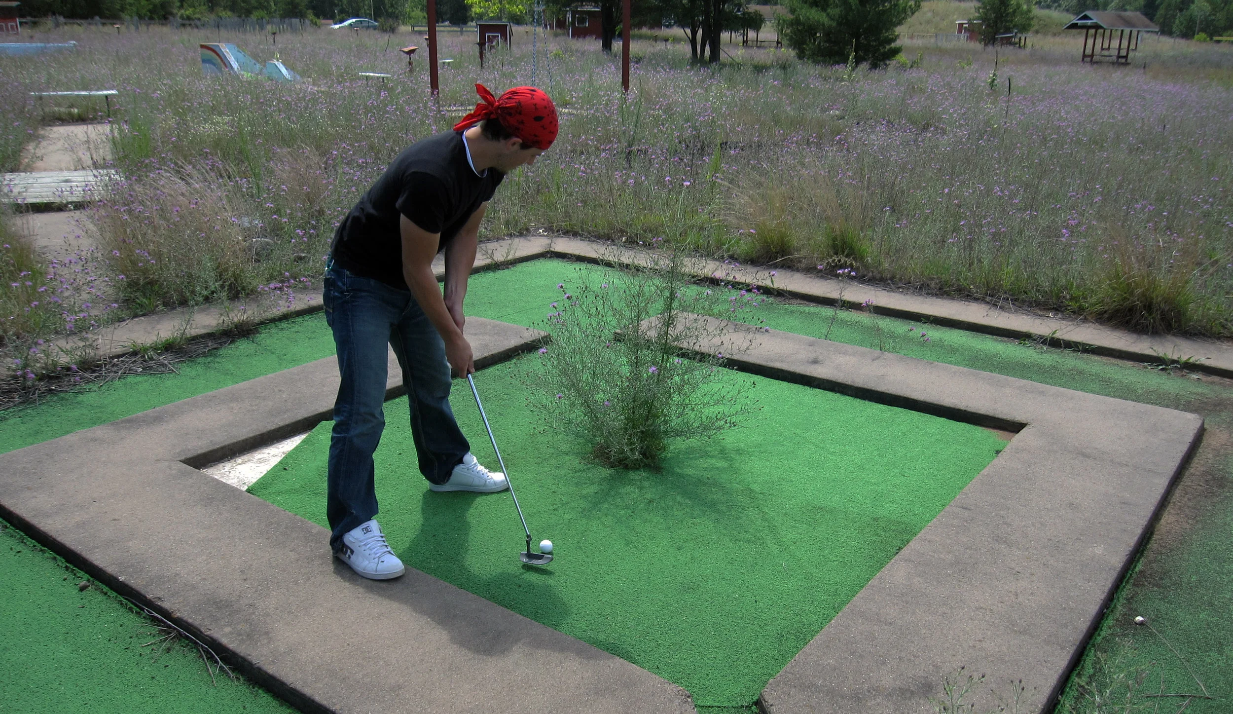 Alex golfing at our first ever course, an abandoned course somewhere between Spooner and Siren, Wisconsin. Over the next three weeks we're making plans for the 11th annual trip as we go to Maine. 