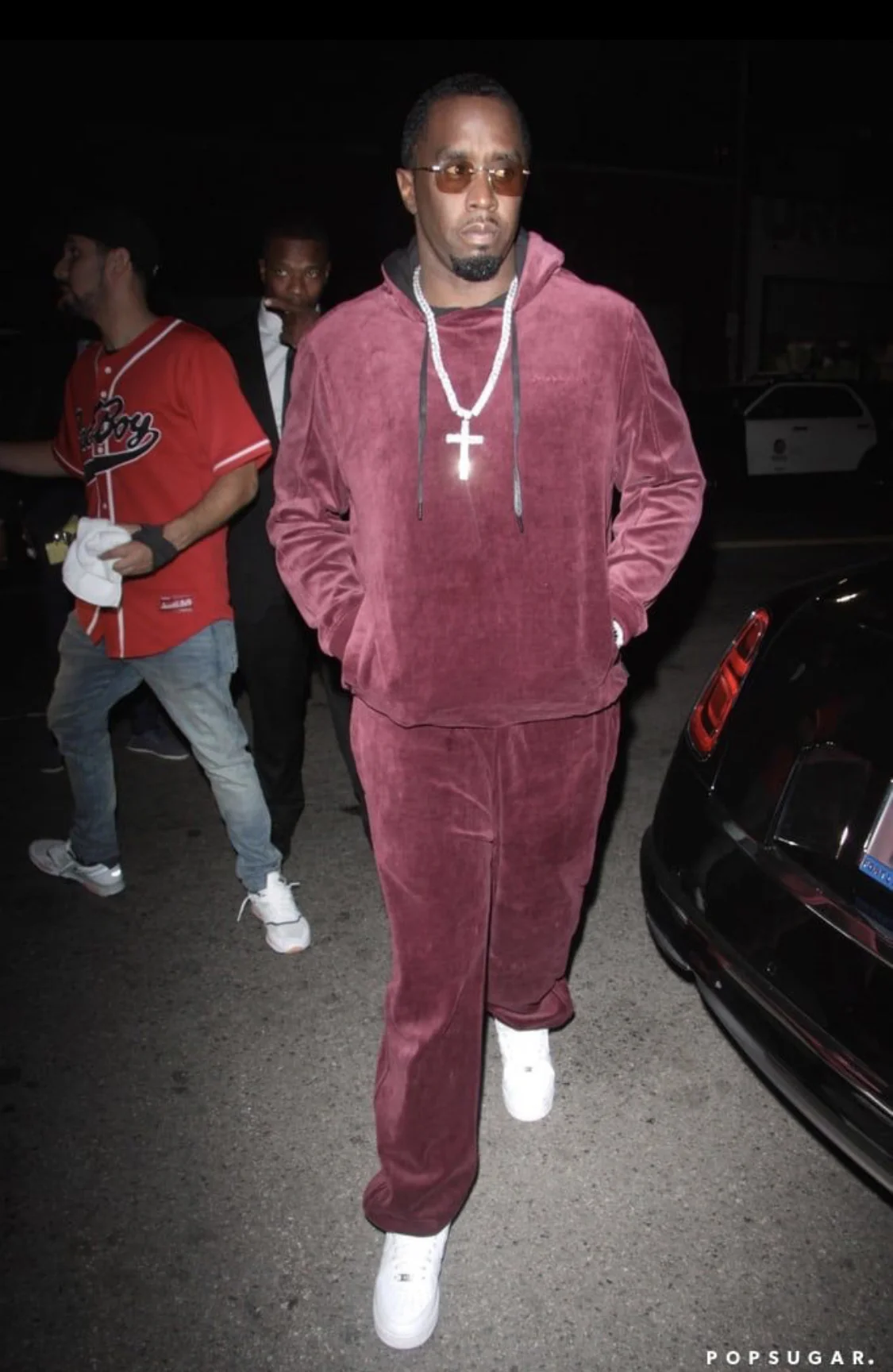 Image Source: Pop Sugar Sean Combs leaving Drake’s 2000s inspired LA Party, 2018