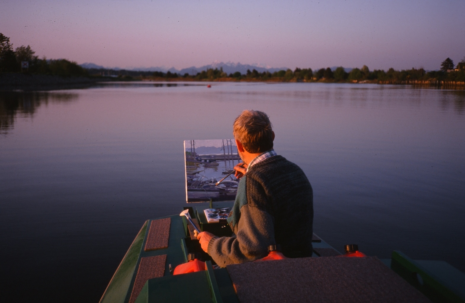 Robert Genn on his flat-bottomed scow Alexander Mackenzie on the Nicomeckl River, South Surrey, BC, Canada circa 2000.