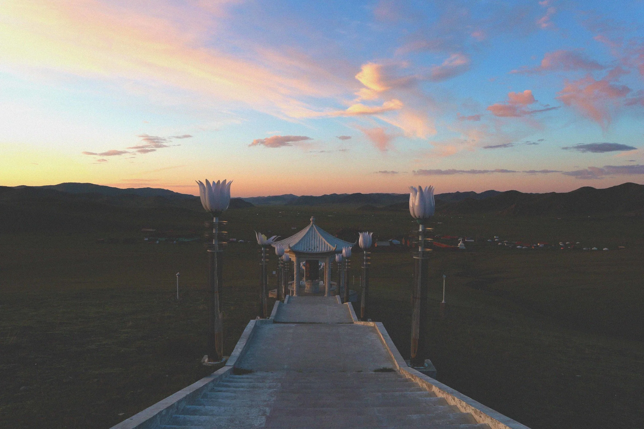 view from the stupe at the amarbayasgalant monastery in mongolia sunrise beautiful sky