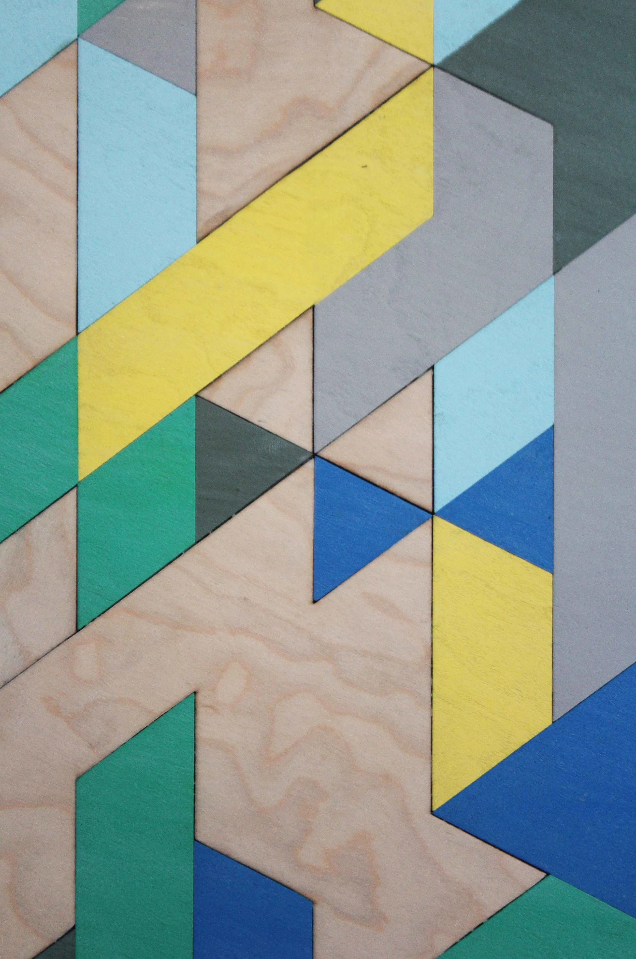 Studio Mali close up of geometric laser cut plywood coffee table