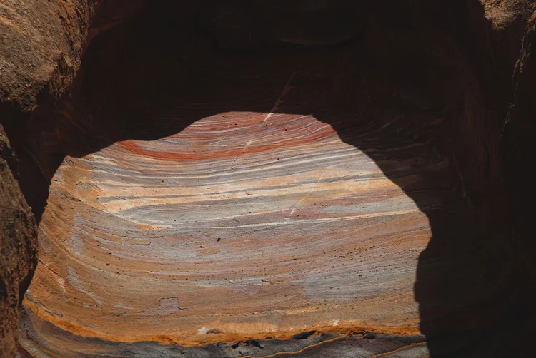 Jordan, Petra - layered coloured sand pattern