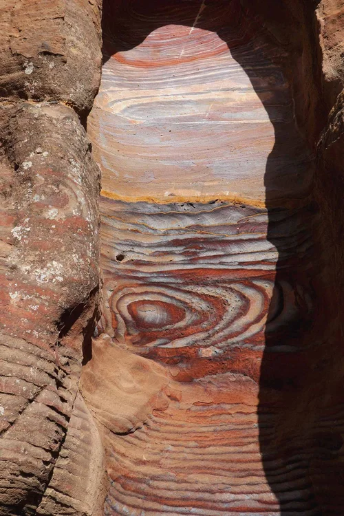 Jordan, Petra - layered coloured sand pattern