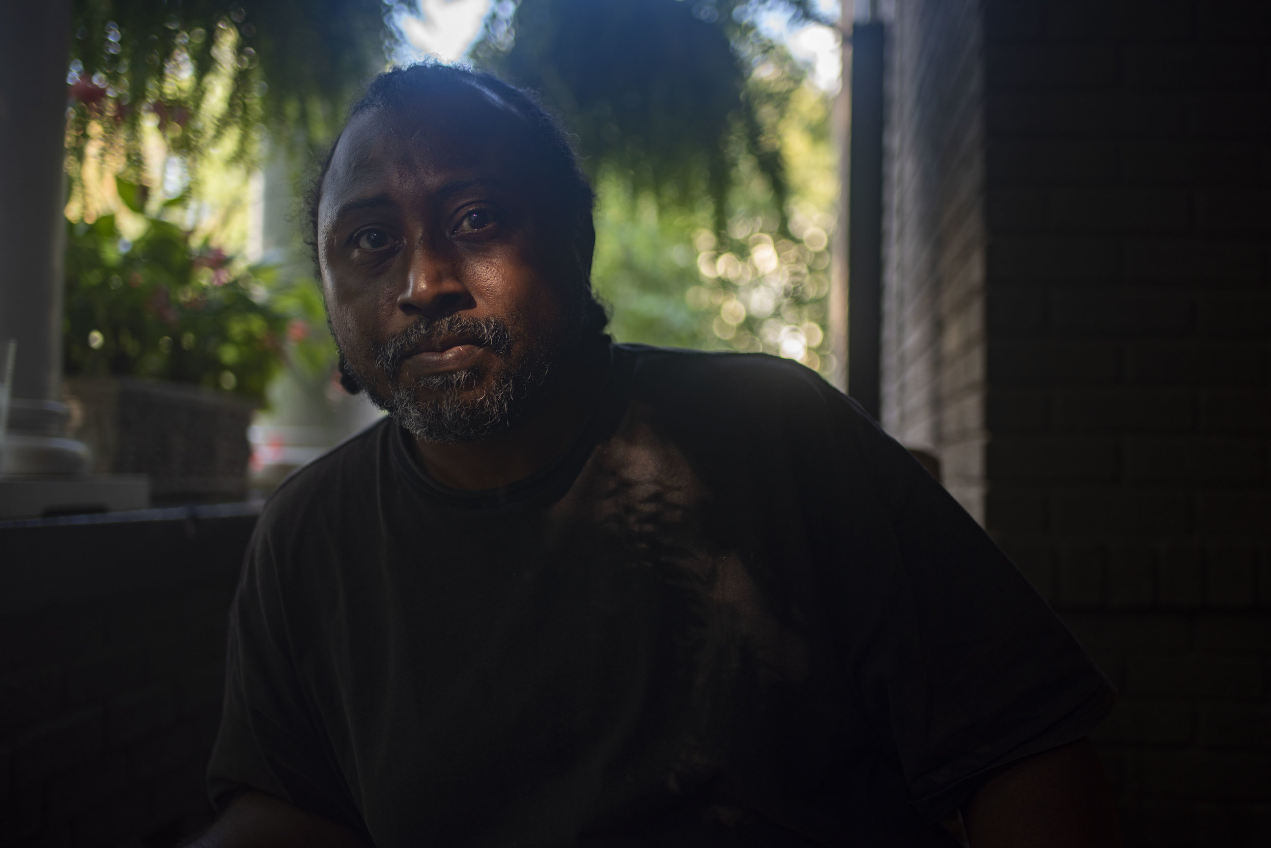  With a mission around dignity in death, Joseph’s House houses many residents who are getting better under the diligent care of the nurses, staff, and volunteer and their fellow neighbors.  Antoine Smith, 43, sits on the front porch at Joseph’s House