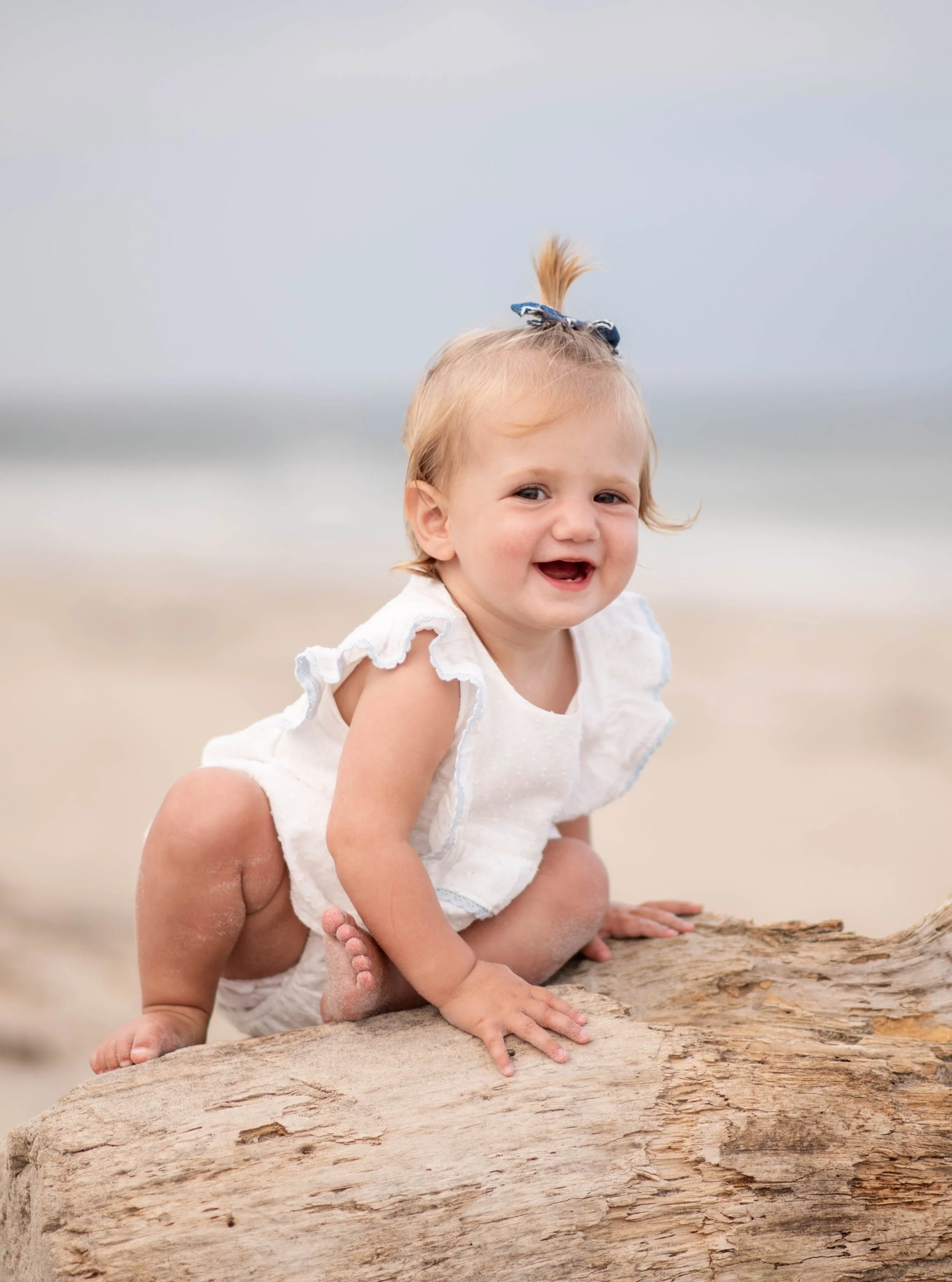 Two sisters as sweet and spunky as can be! It was so special to capture the McKews while they were in Maine visiting family. I've known this lovely family since Sadie (she climbed up there completely on her own, by the way!) and Ruthie's dad was my c