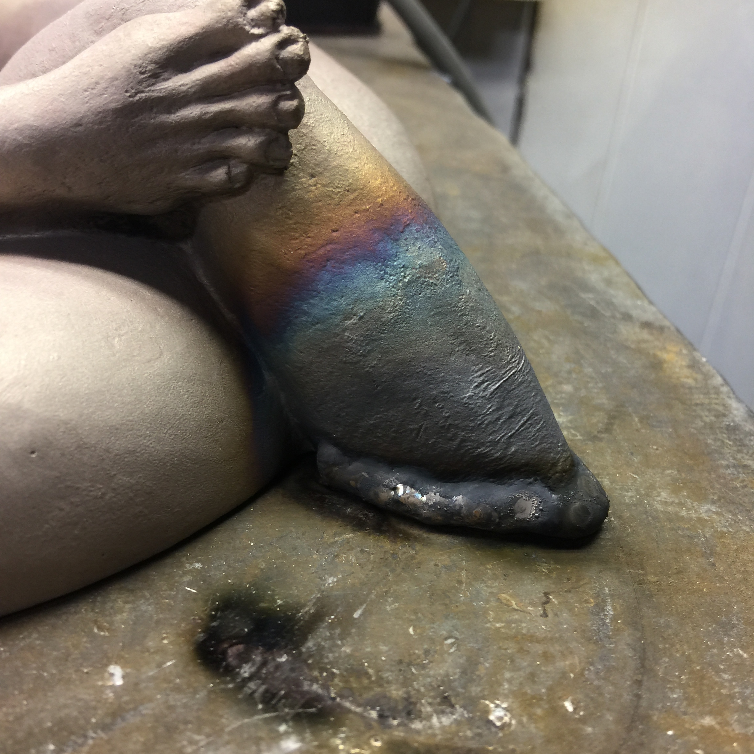  The press along with some hammering got the perimeter of the tube down, but the arm &amp; leg shrunk in the fire, so I'm adding bronze by TIG welding. 