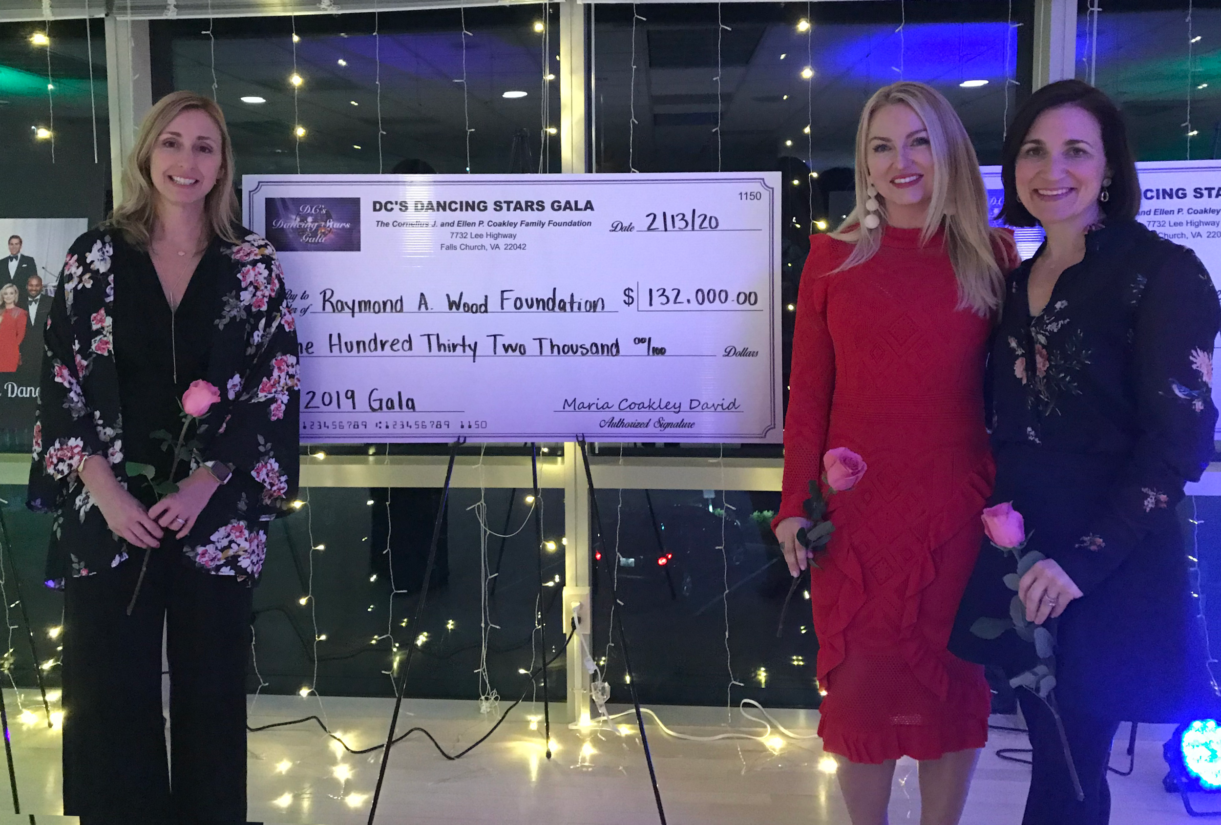 Amy Wood (Wood Foundation Director), Lindsey Keatley, (dancer and fundraiser), and Caroline Coakley (Wood Foundation board member) pose with the big check.