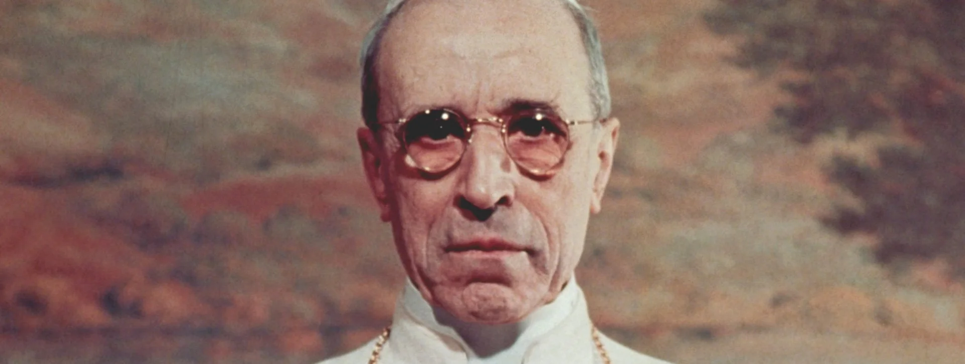 However, in 1963, after a few years of his death, his reputation came to be questioned after the scandal caused by the premiere of the play The Deputy, by Rolf Hochhuth. 