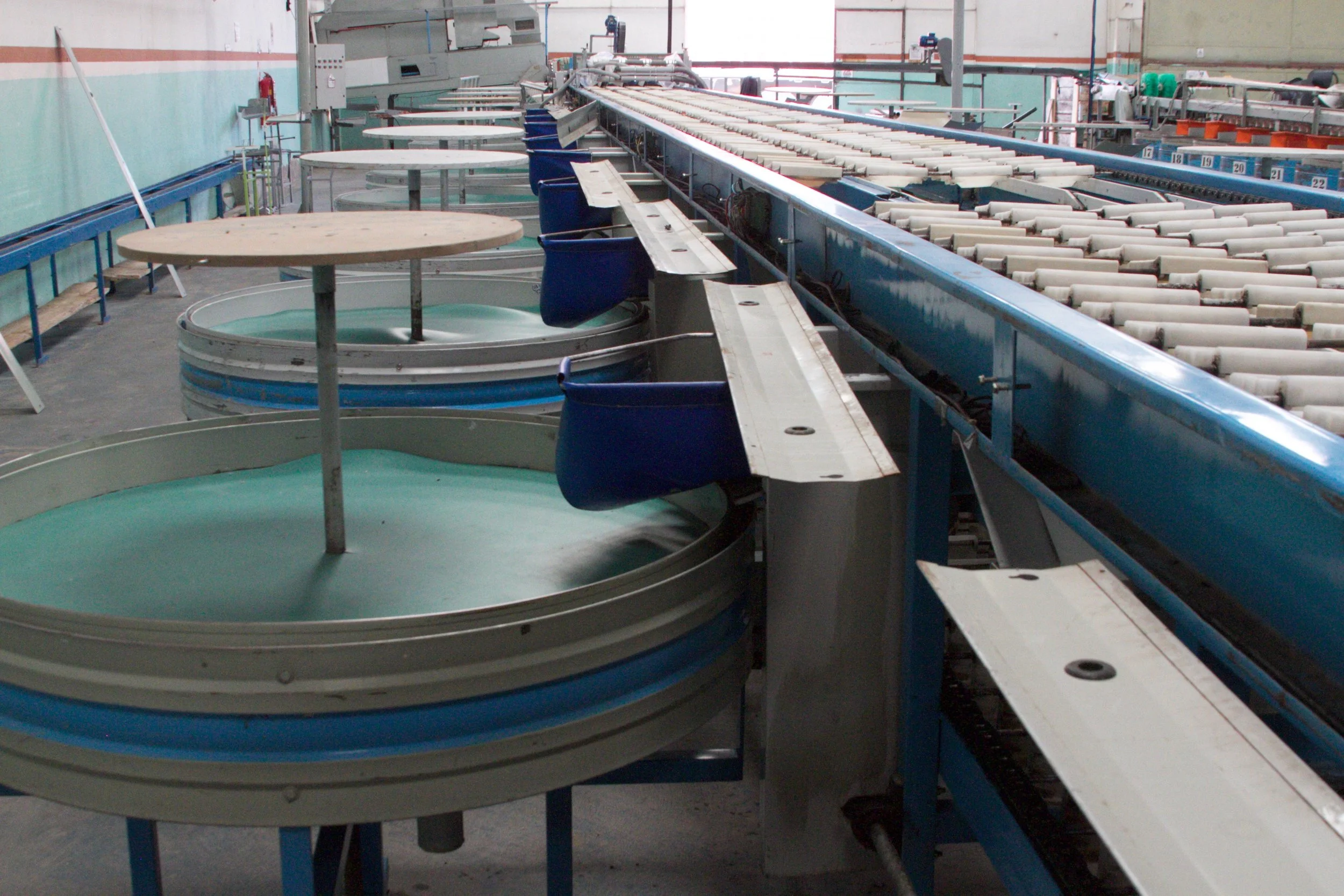 Apples are sorted mechanically, and with hand labor.