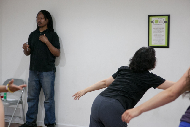 Co-Director of Full Force, Kadeem Alston-Roman Doing Energy Medicine During a Workshop.