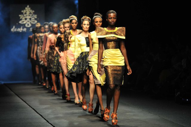 Models present a creation by the Duaba Serwa fashion house during African Fashion Week at Melrose Arch in Johannesburg. Picture: IHSAAN HAFFEJEE (27.10.2012)