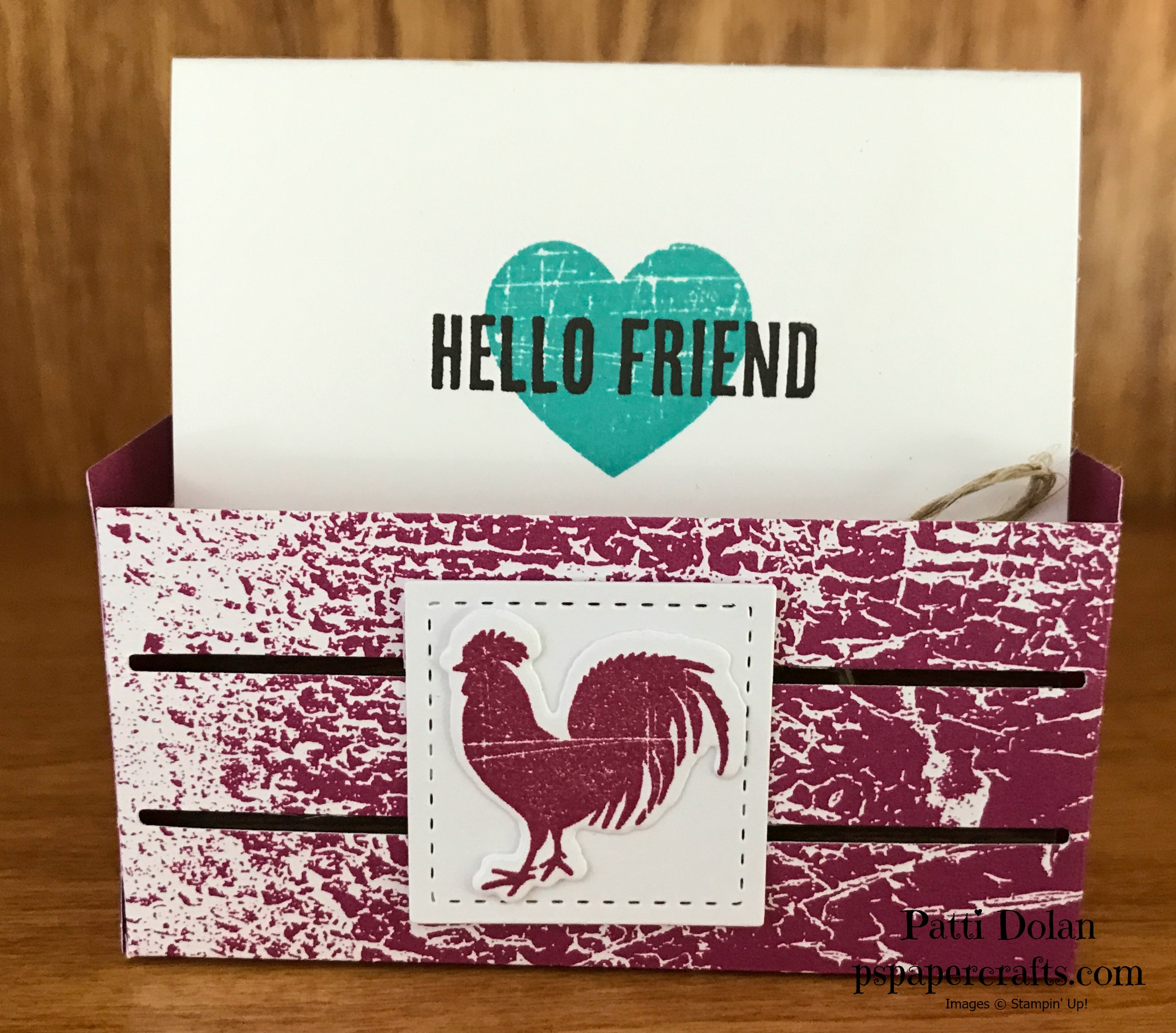 This is the crate that I make in the video. Its made with Color Series Designer Series Paper (DSP). I stamped the Rooster in Berry Burst using the Wood Words stamp on Whisper White cardstock and cut it out using the the Wood Crate Framelits. I adhered it to the smallest square from the Stitched Shapes Framelits.