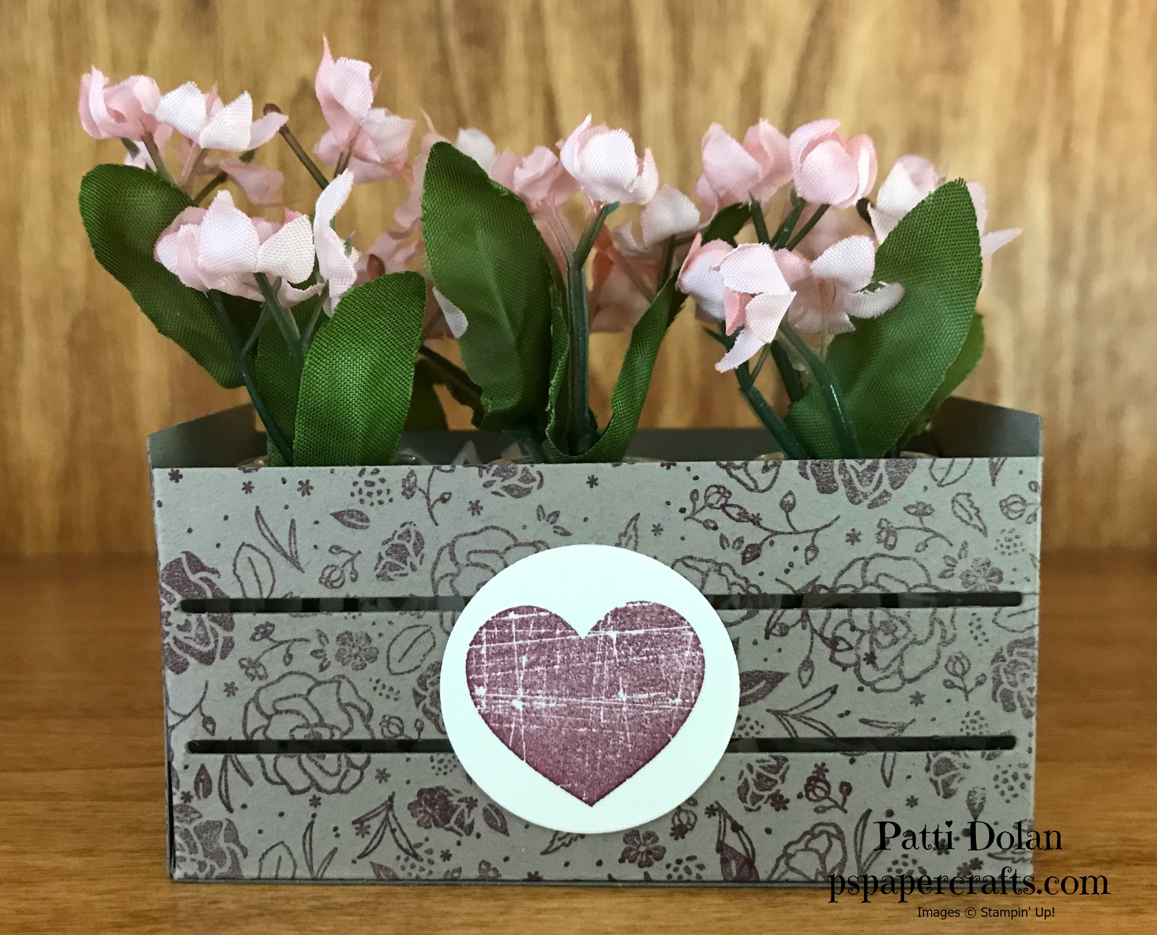 I cut the crate from Crumbcake Cardstock that we stamped with the flowers from the Wood Words set in Fresh Fig. I stamped the heart from the same set in Fresh Fig ink and cut it out using the Layering Circles and adhered it to the crate