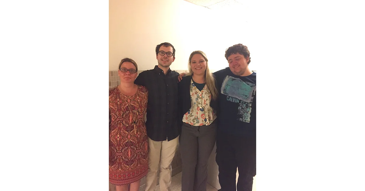 My mom, brothers, and me after I defended my master's thesis, June 26, 2017.