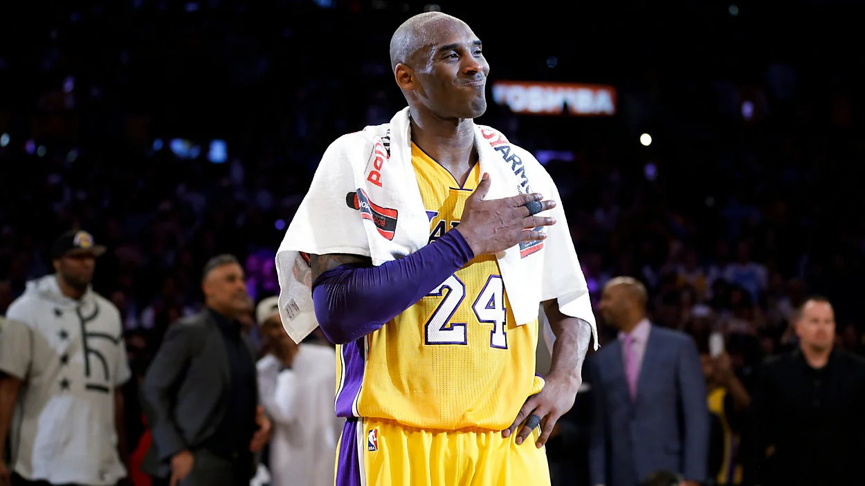 Los Angeles Lakers' Kobe Bryant pounds his chest after the last NBA basketball game of his career, against the Utah Jazz, Wednesday, April 13, 2016, in Los Angeles. Via Spectrum Local News