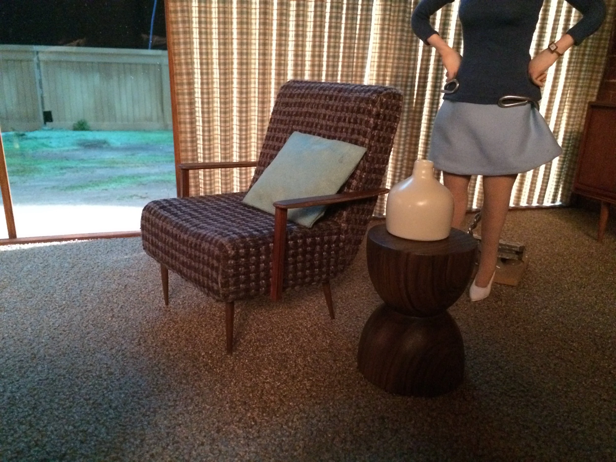 armchair and hourglass side table