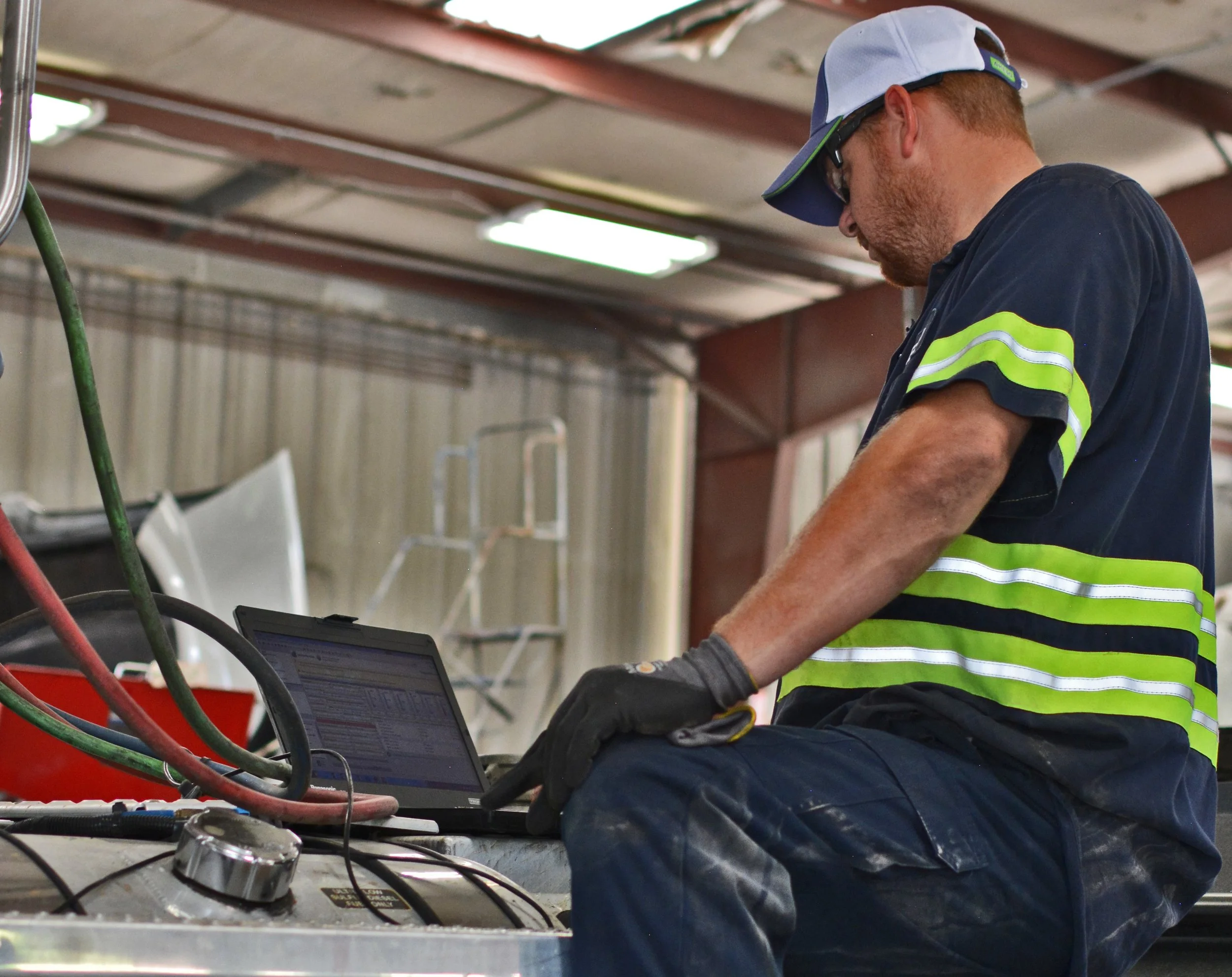 Tommy analyzes maintenance report.jpg