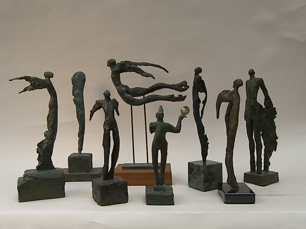 small bronze sculptures: Nikes & Winged Beings