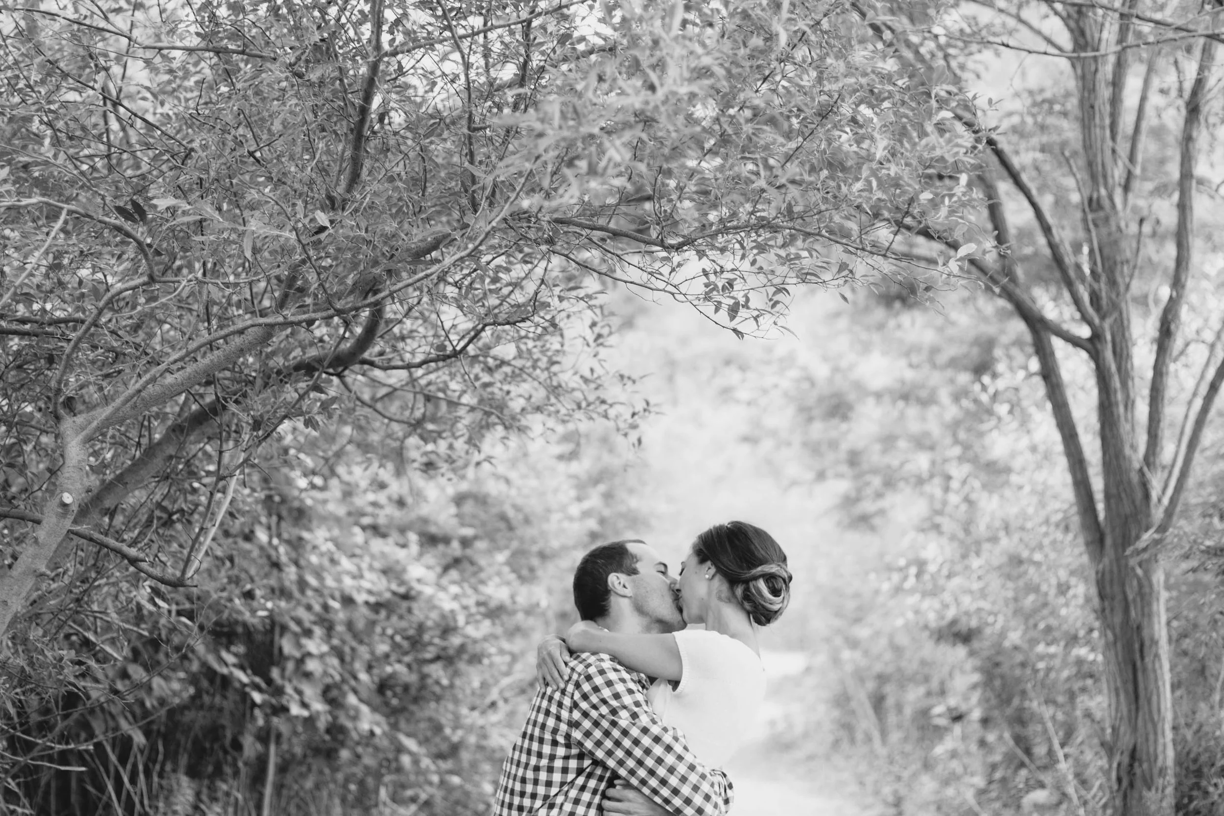 Kissing in the park.jpg