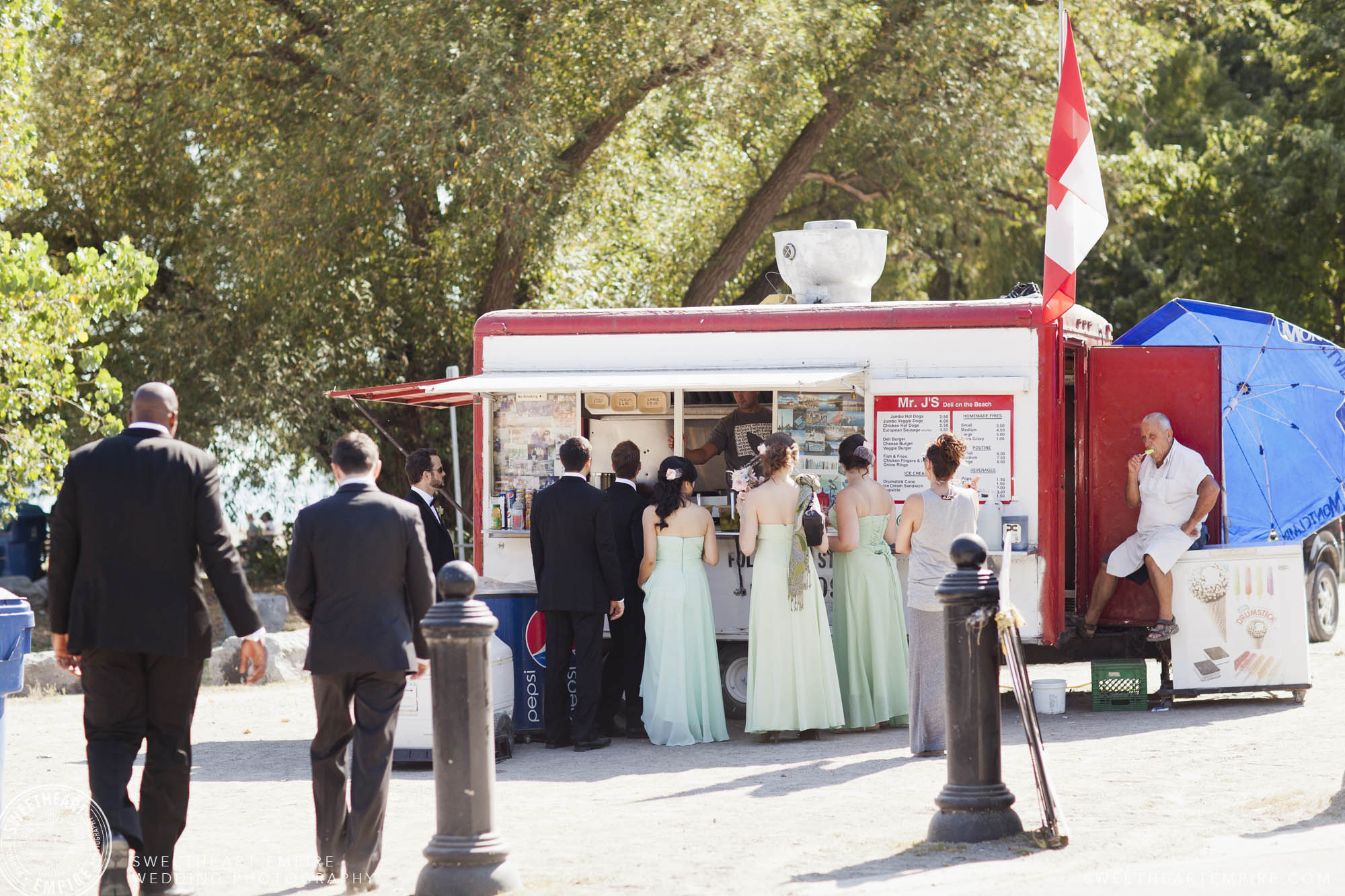 Bridal party visiting a wedding day food truck.