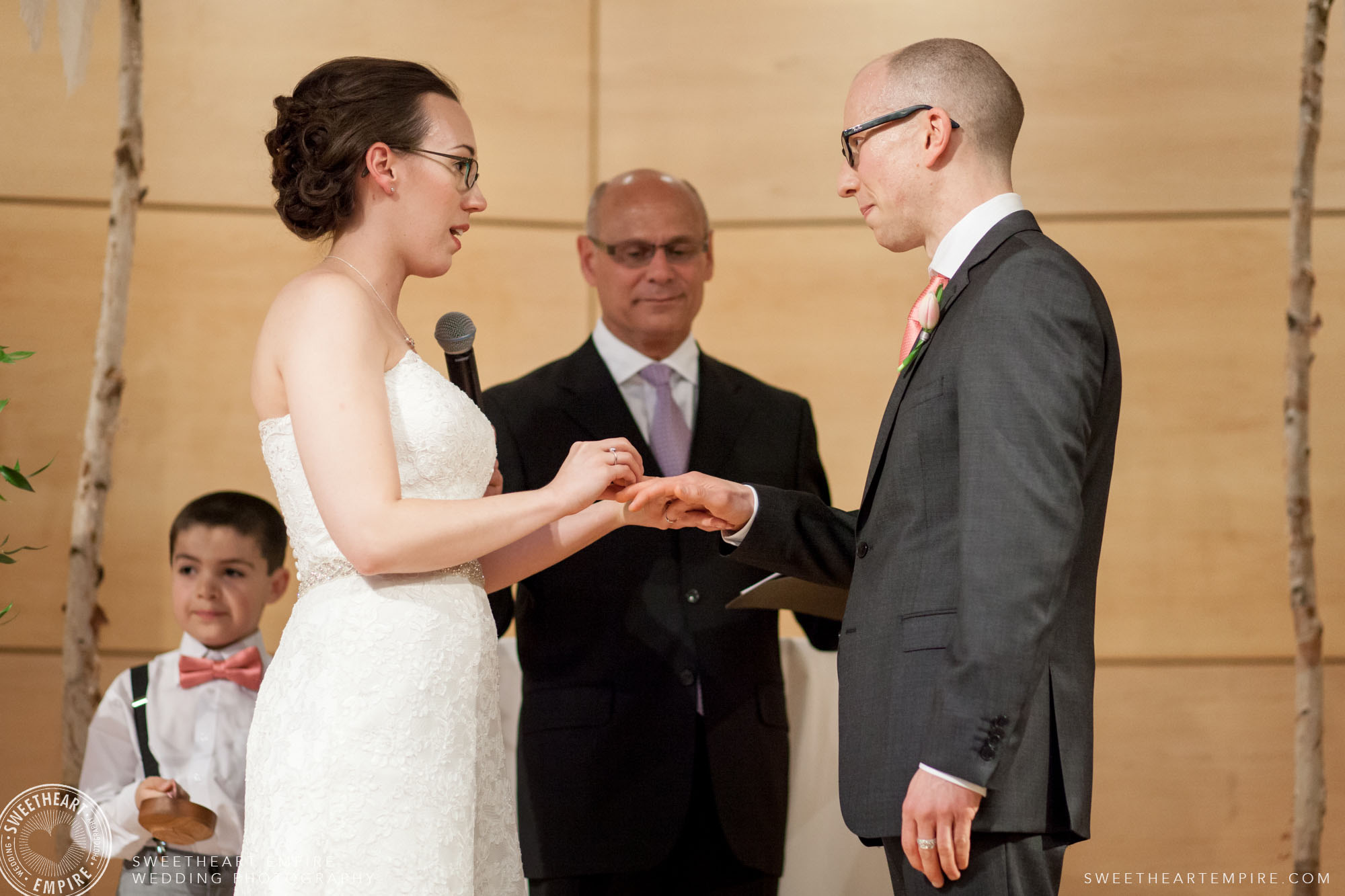 Bride and groom exchanging vows; Toronto Reference Library Wedding