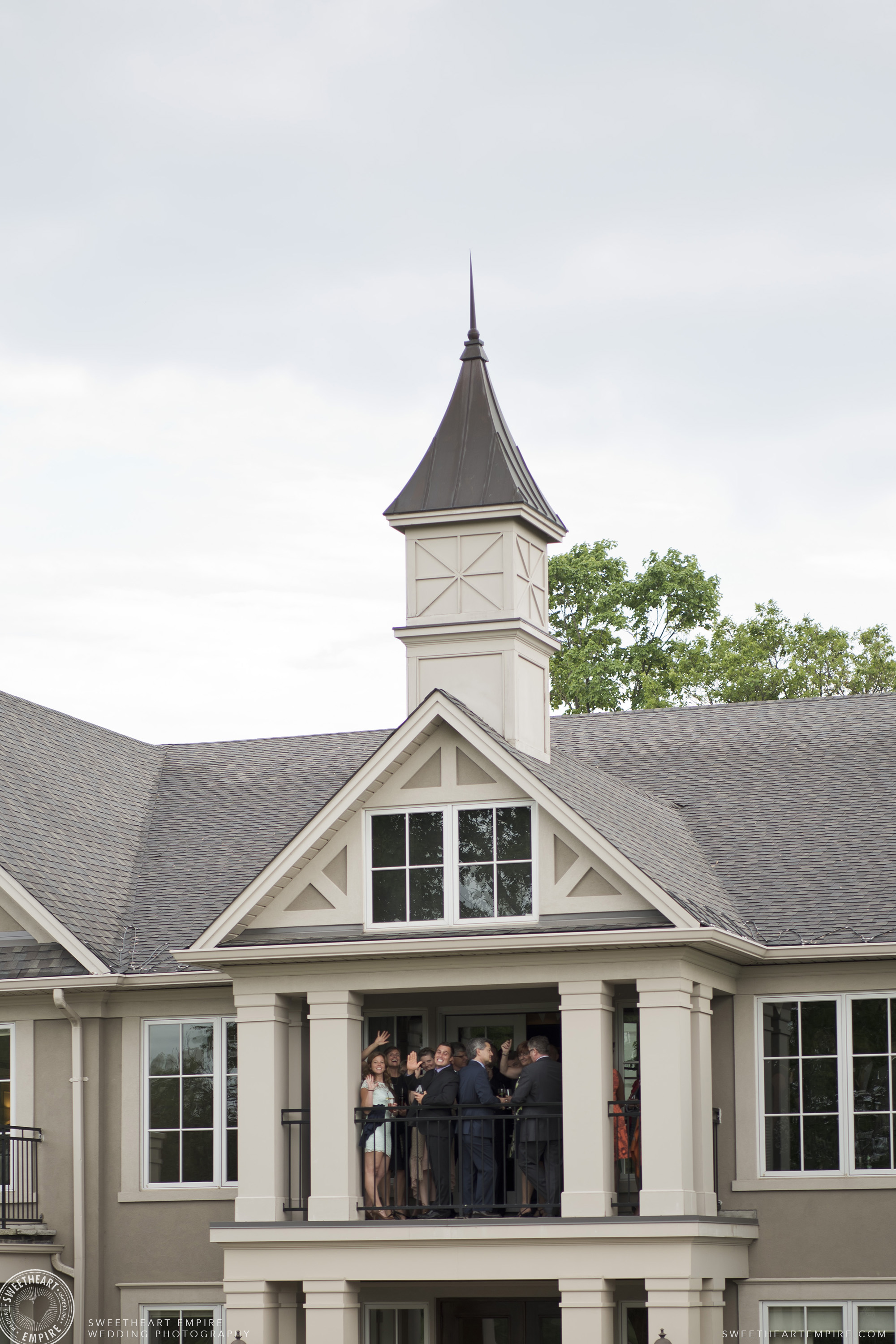 Guests on the balcony at Oakville Golf Club Wedding 