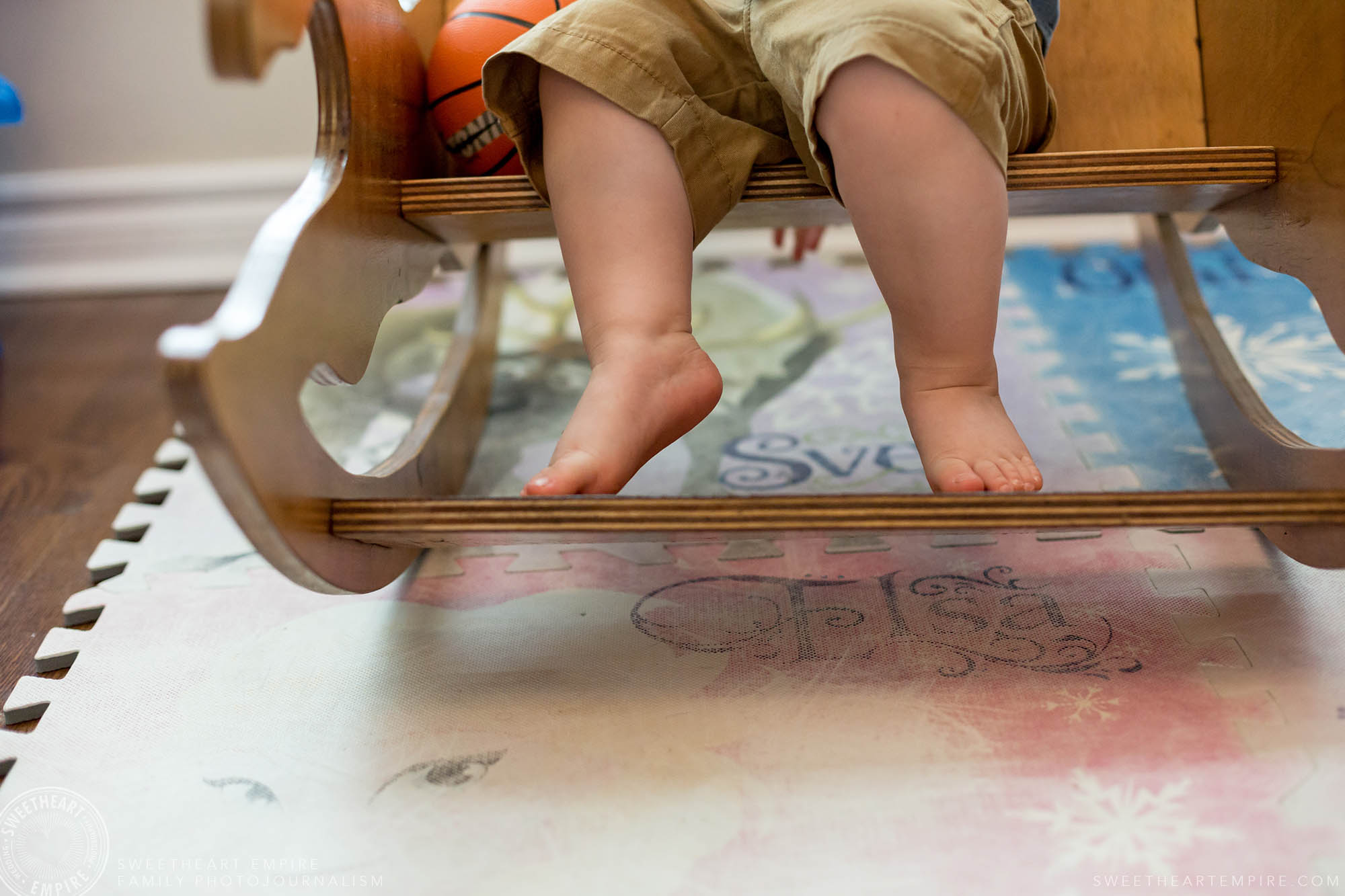 14_Close up of toddler's toes on rocking horse.jpg