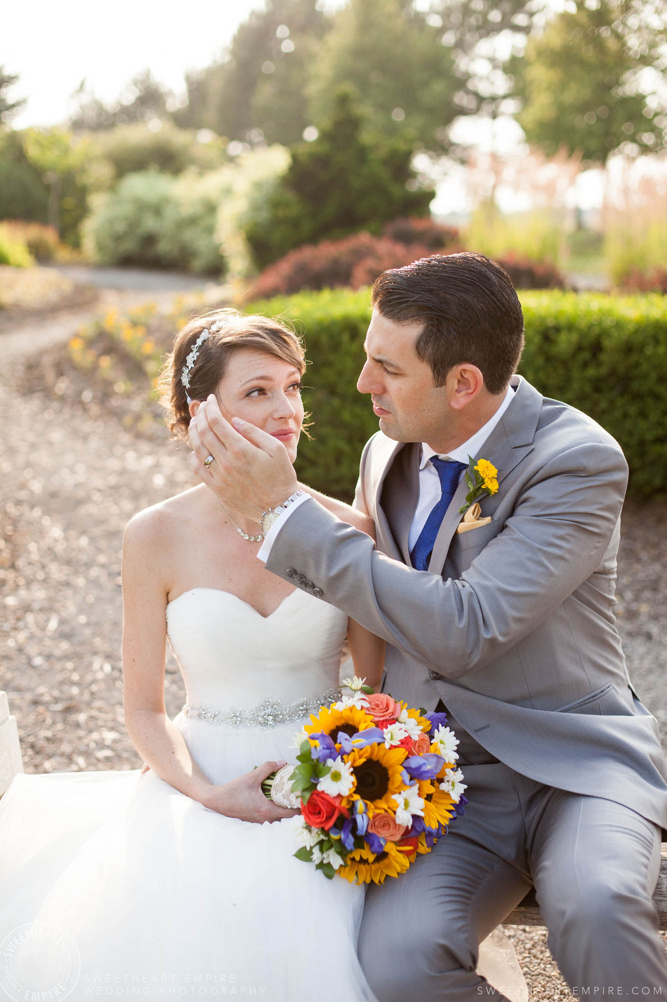 Groom caressing the bride's face, Rockway Vineyard Wedding, Niagara