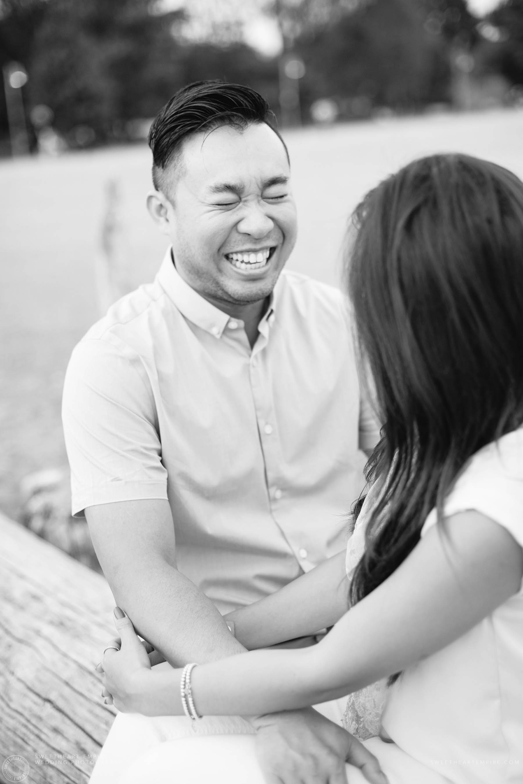 Groom to be laughing, Engagement Photos at Kew Gardens