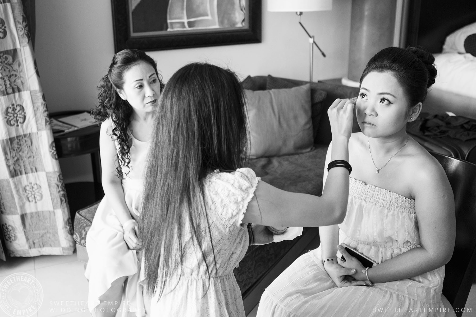 Bride getting her makeup done; Iberostar Grand Hotel Rose Hall, in Montego Bay, Jamaica