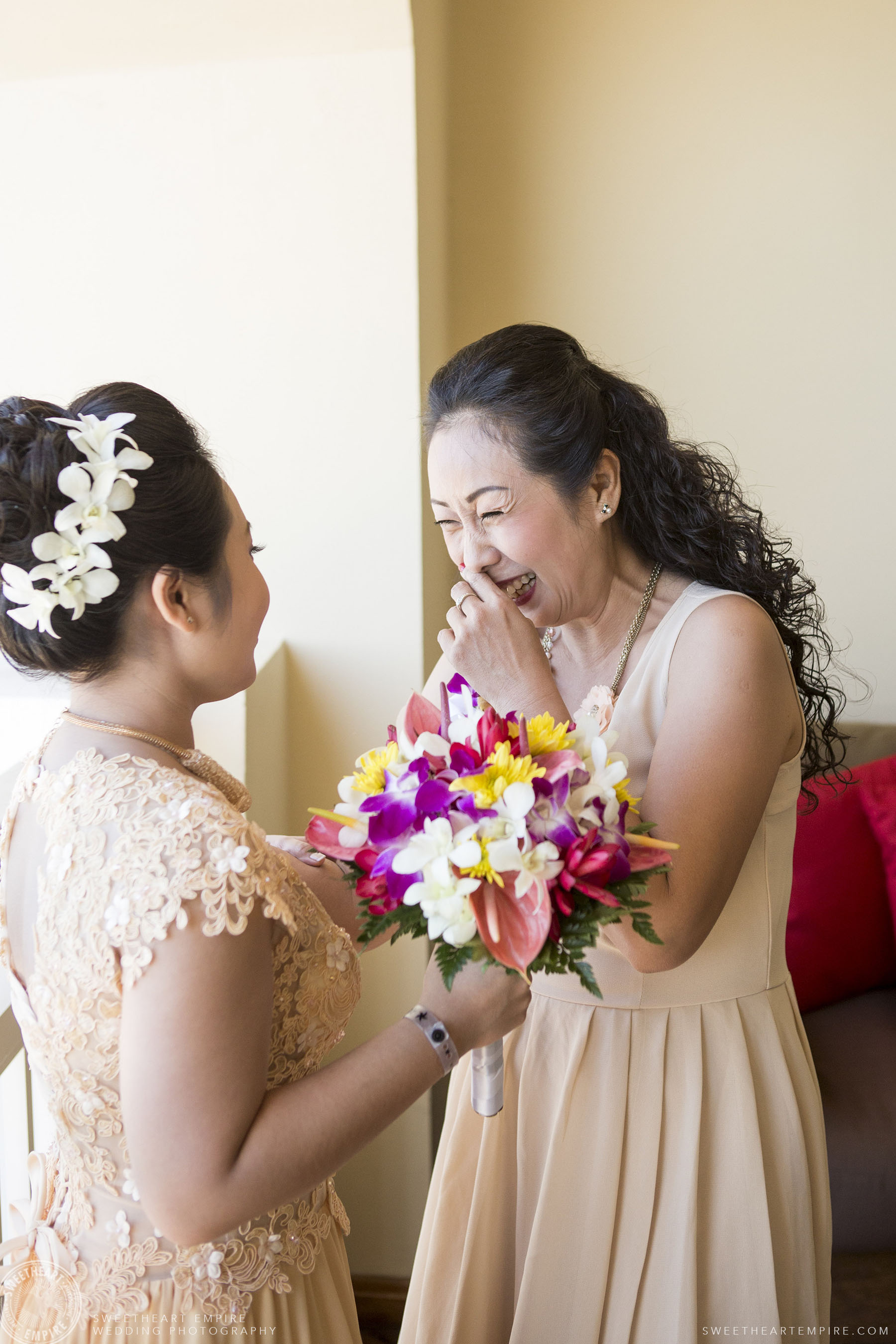 Bride sharing a laugh with her mom; Iberostar Grand Hotel Rose Hall, in Montego Bay, Jamaica