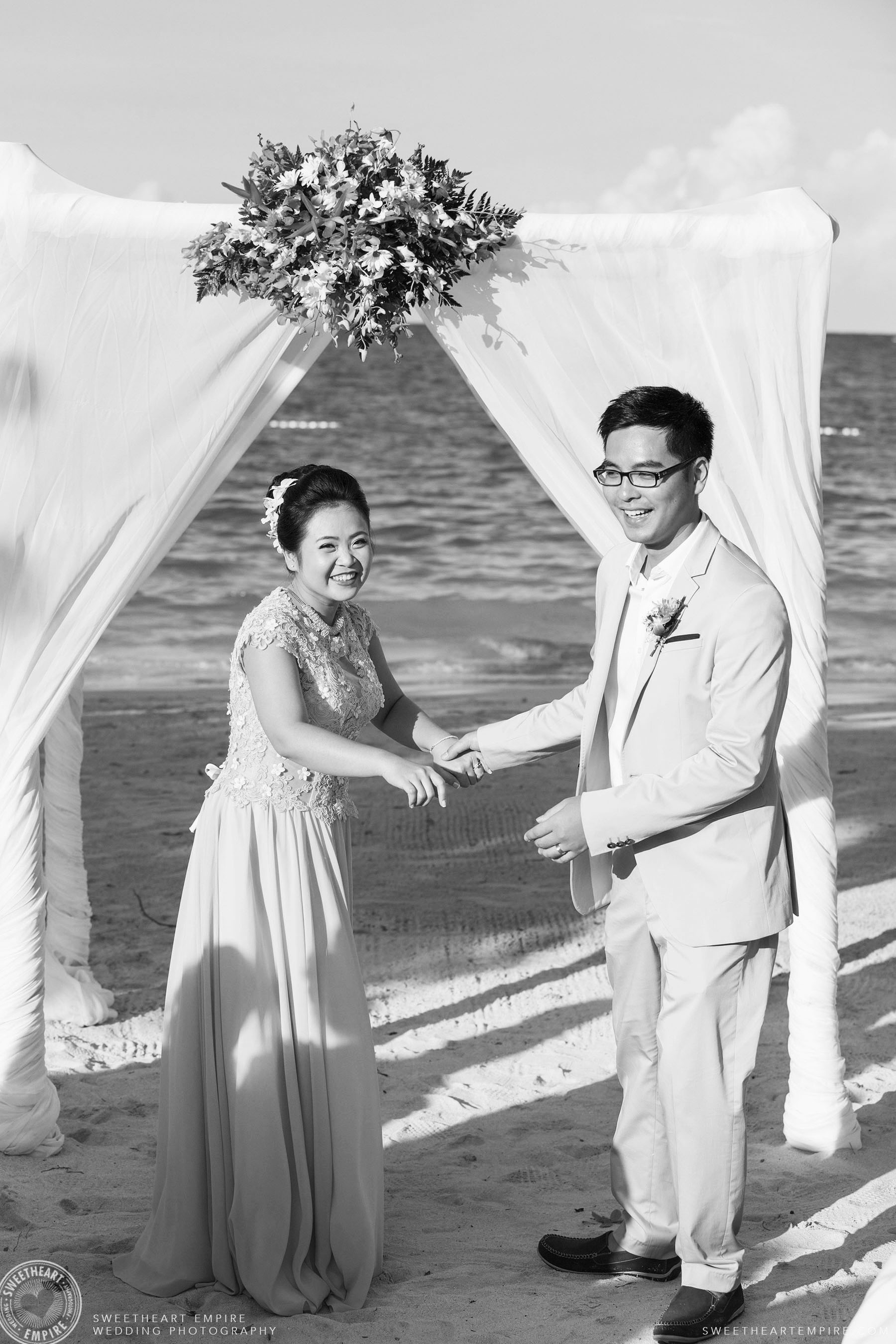 Bride and groom after wedding ceremony; Iberostar Grand Hotel Rose Hall, in Montego Bay, Jamaica