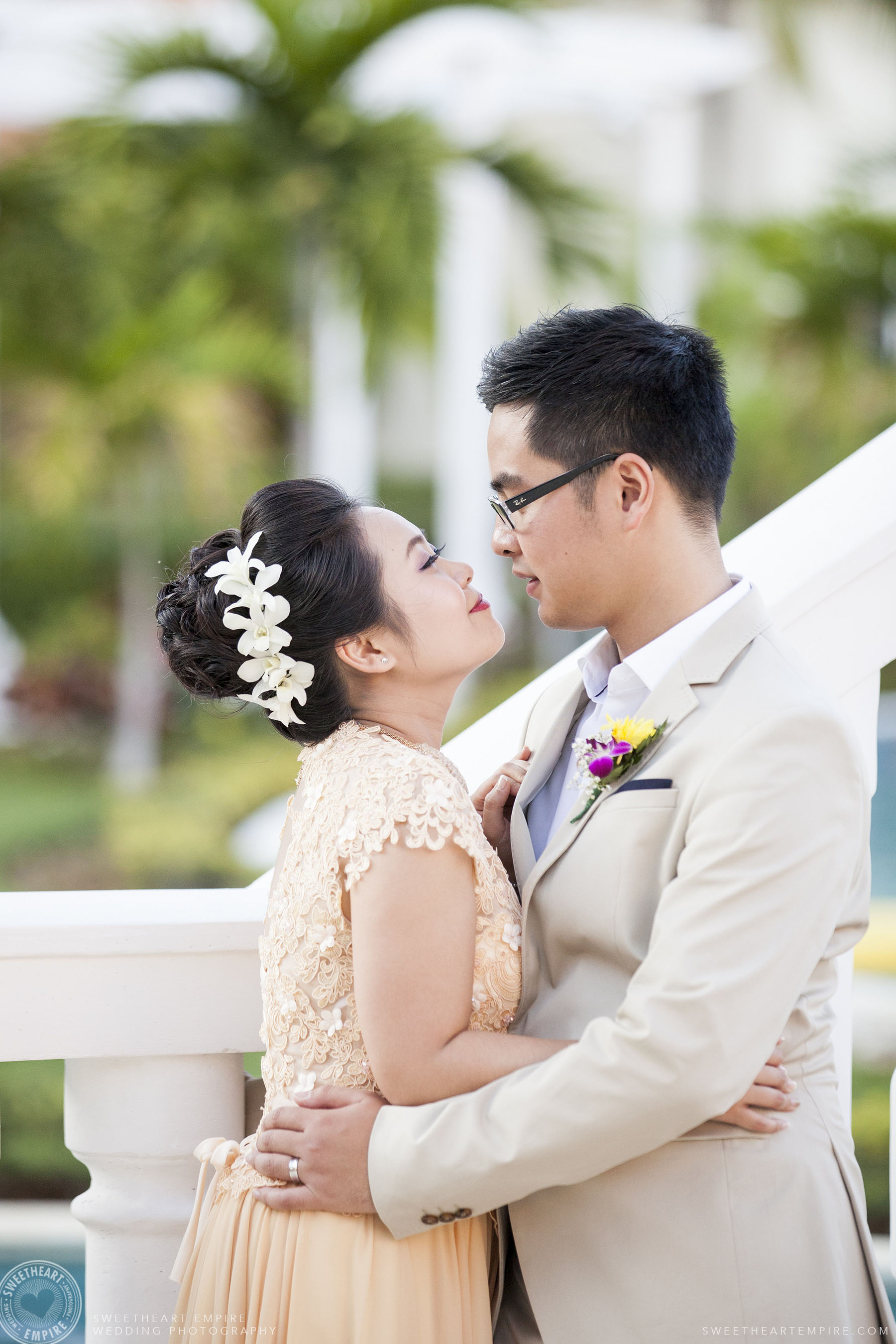 Bride and groom looking into each other's eyes; Iberostar Grand Hotel Rose Hall, in Montego Bay, Jamaica