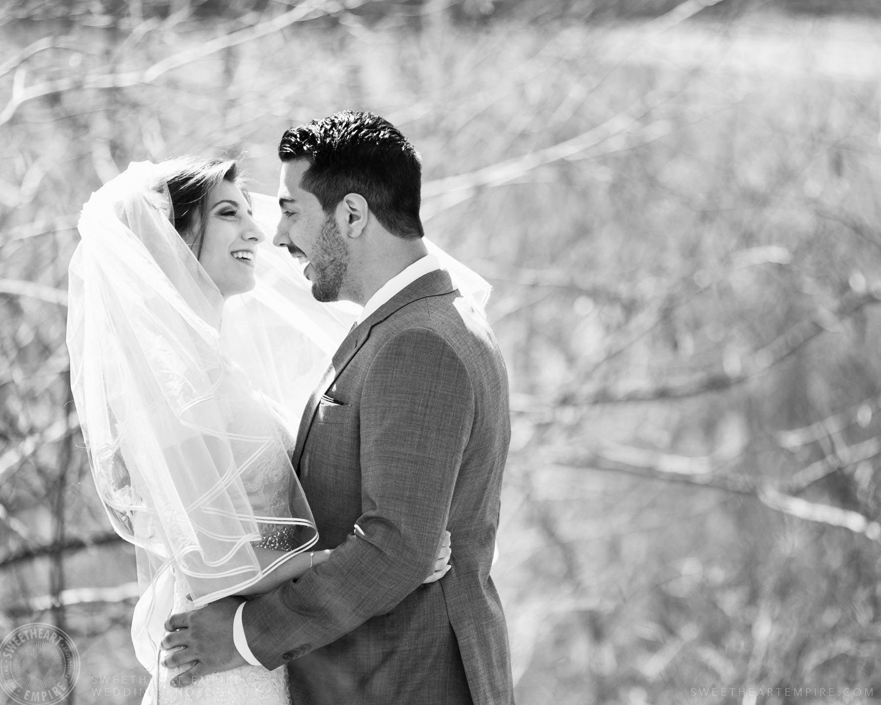 Bride and groom staring into each other's eyes; Eagles Nest Golf Club Wedding Photos