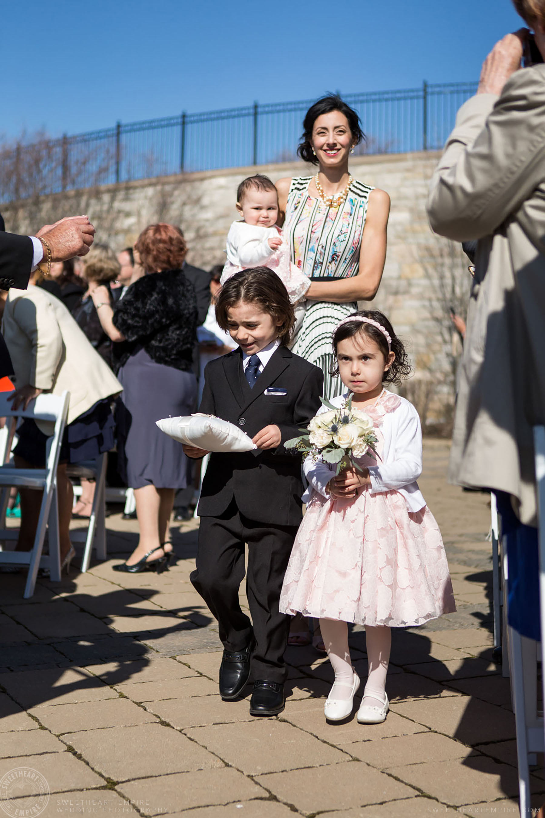 Flower girl and ring bearer walking down the aisle; Eagles Nest Golf Club Wedding Photos