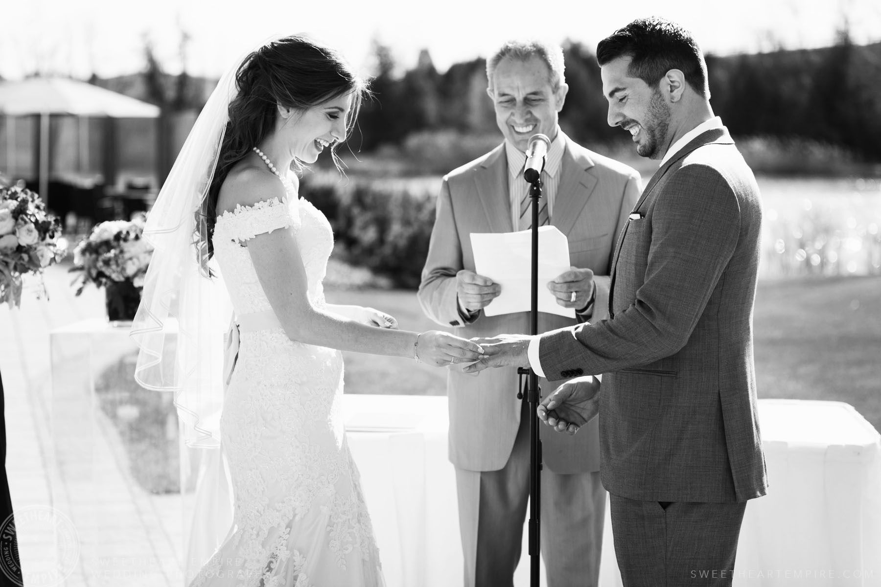 Bride and groom exchanging vows; Eagles Nest Golf Club Wedding Photos