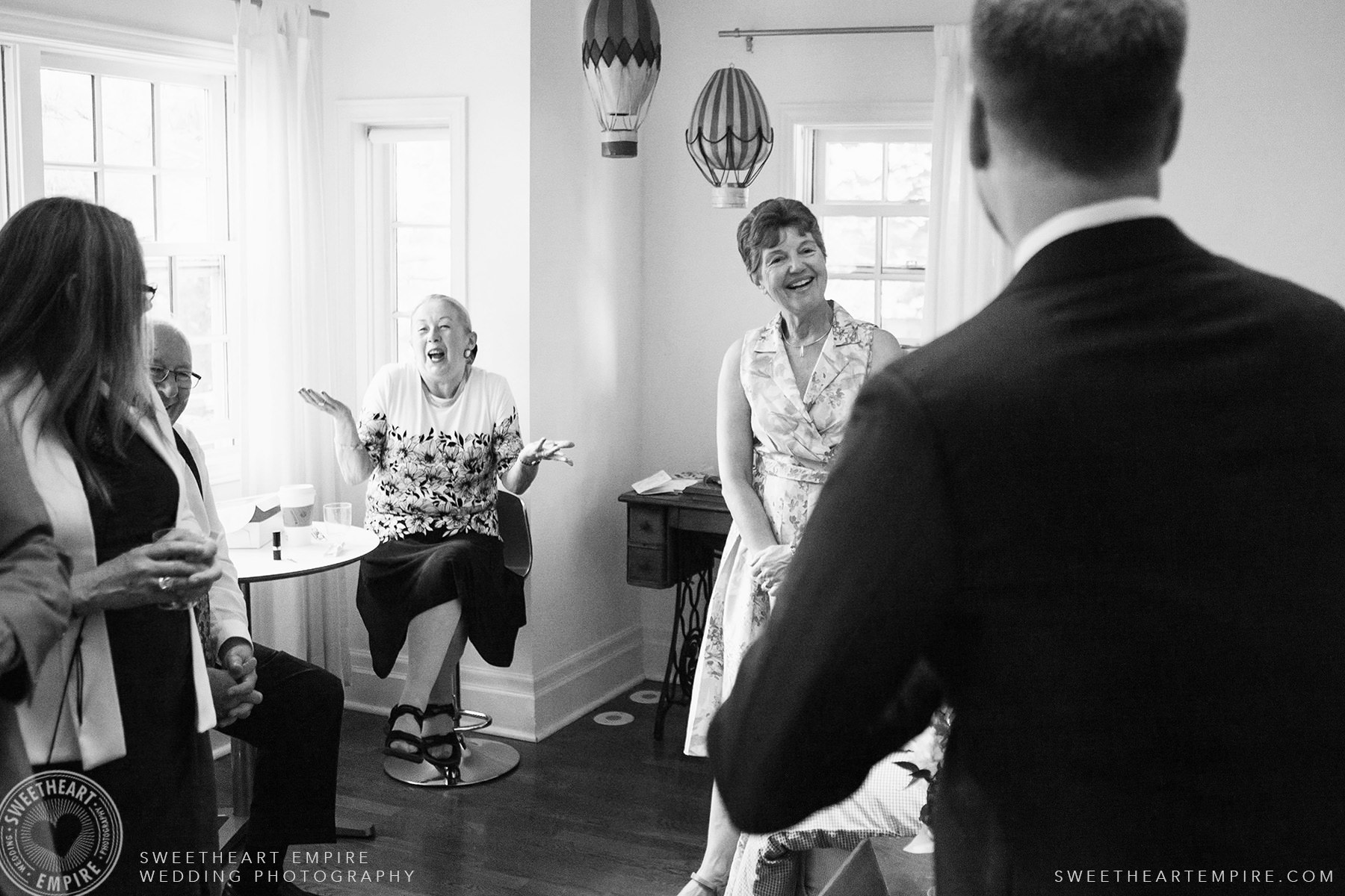 Family mingling while waiting for the wedding to begin, Toronto Island Elopement