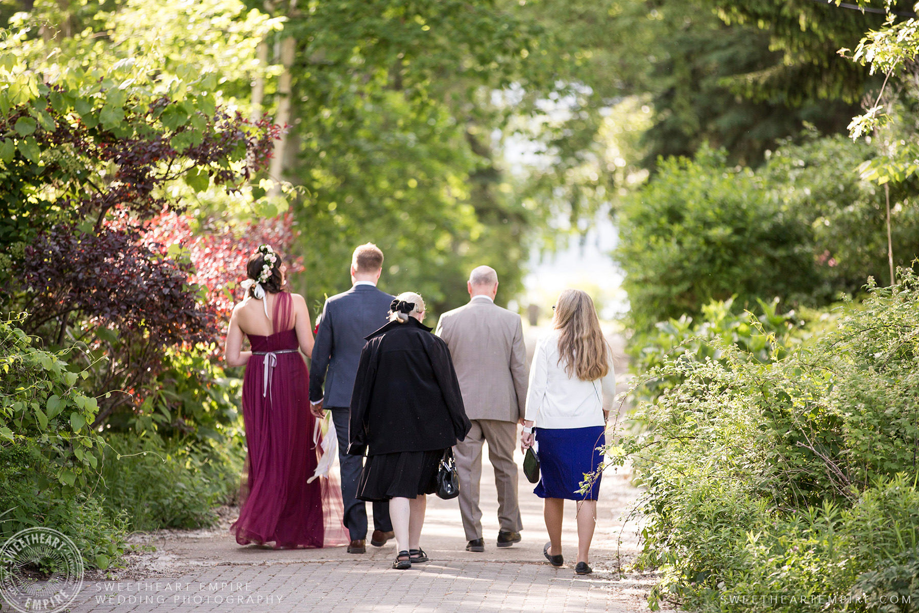 Walking to the ceremony, Toronto Island Elopement