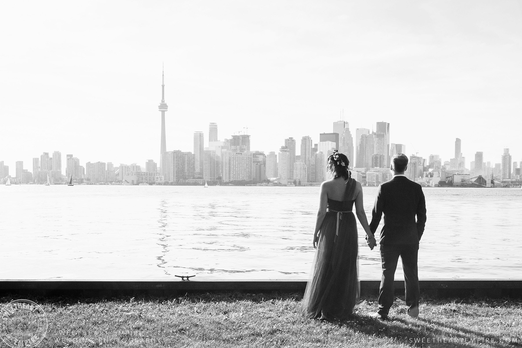 Bride and groom admiring the Toronto skyline, Toronto Island Elopement