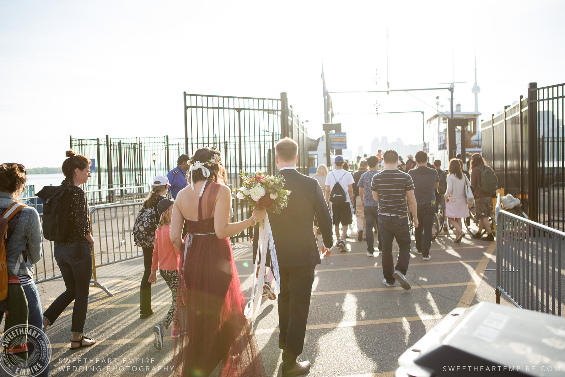 Bride and groom boarding the ferry back to Toronto, Toronto Island Elopement