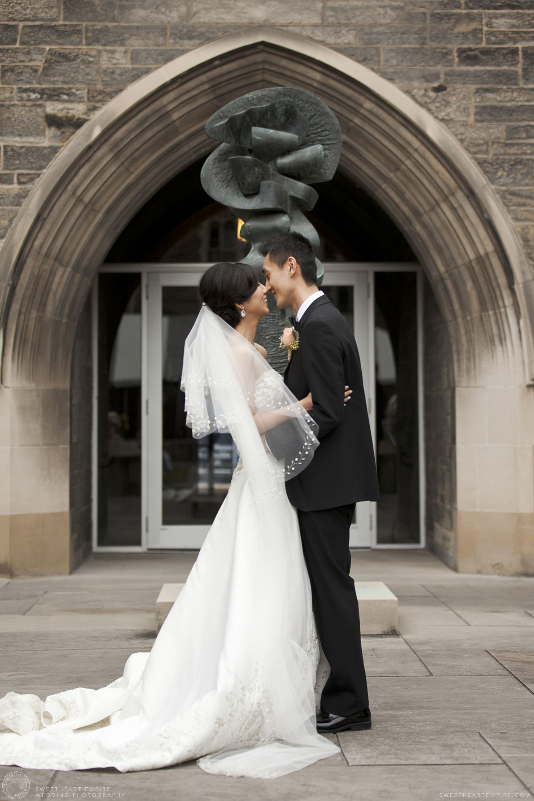 Bride and groom getting ready for a kiss after marriage ceremony, Hart House University of Toronto Wedding