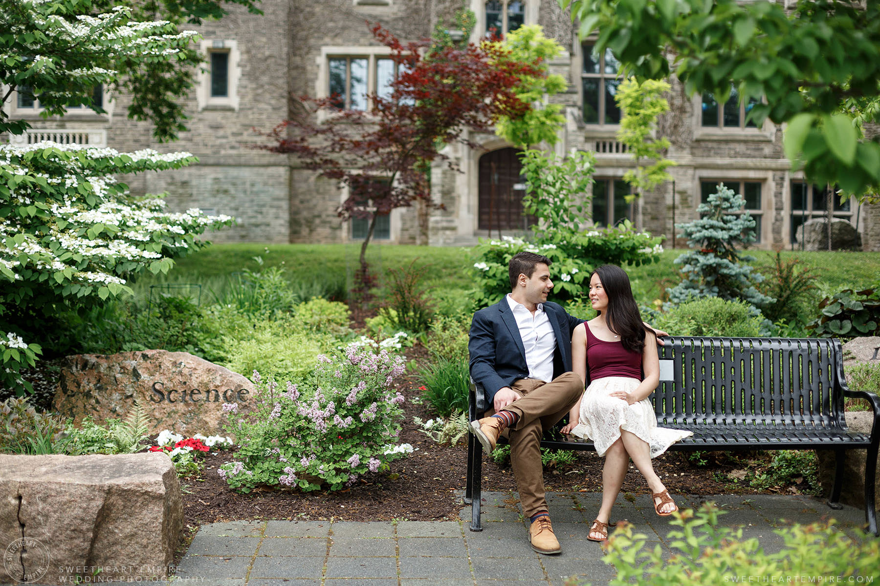 Couple sitting together in the gardens at McMaster University, McMaster University Engagement Session
