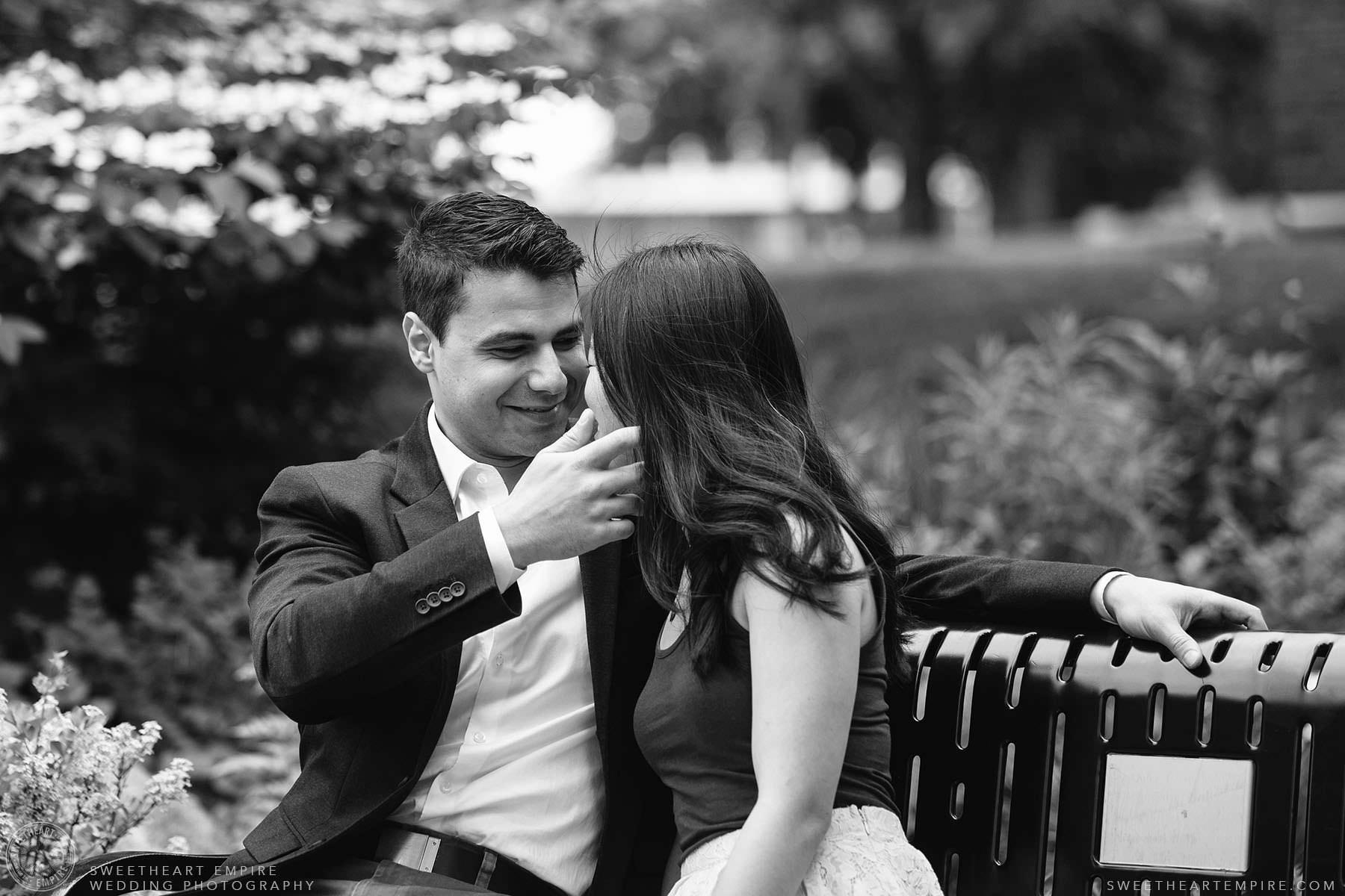 Groom to be smiles at his bride to be, McMaster University Engagement Session