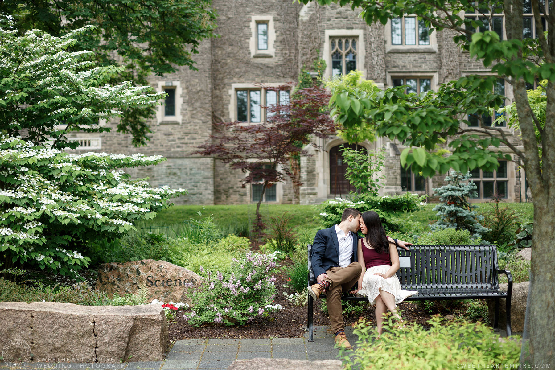 Couple kissing in the gardens at McMaster University, McMaster University Engagement Session