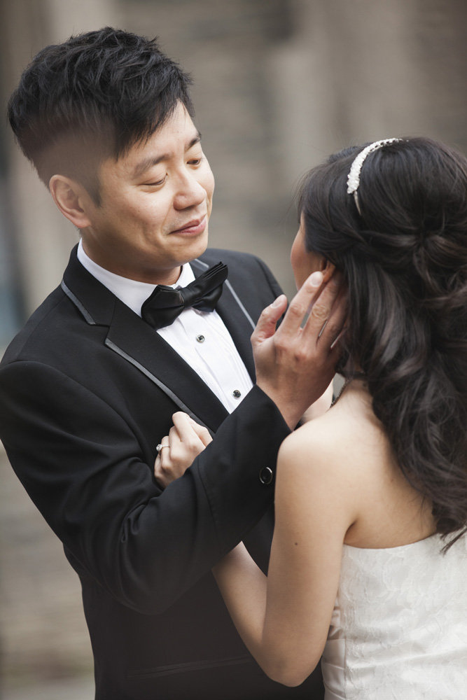 Groom caressing bride's face, Bayview Golf & Country Club Wedding