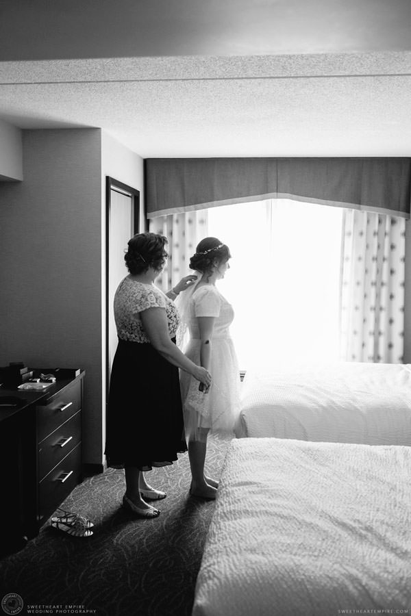 Bride's mom helping her get ready; Aberfoyle Mill Wedding