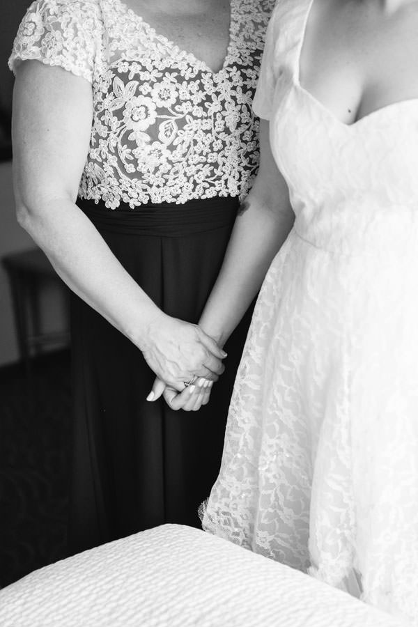 Bride holding hands with her mother; Aberfoyle Mill Wedding