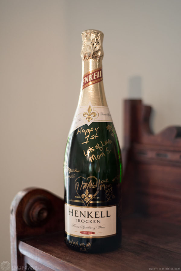 Bottle of champagne at the groom's house; Aberfoyle Mill Wedding