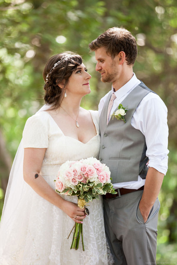 Bride and groom share a loving look; Aberfoyle Mill Wedding