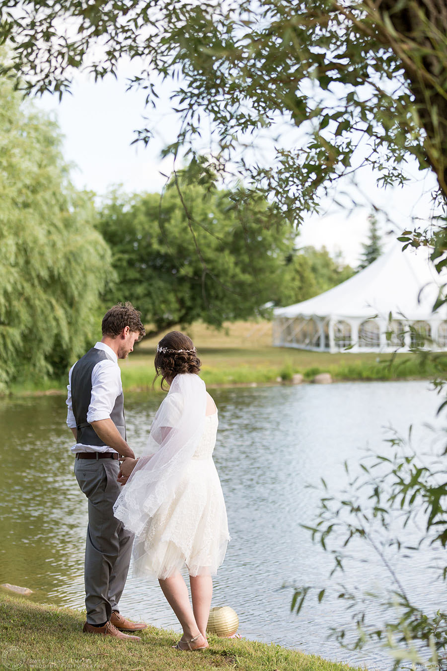 Bride and groom by the water; Aberfoyle Mill Wedding